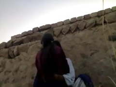 Muslin teen with guy in feild